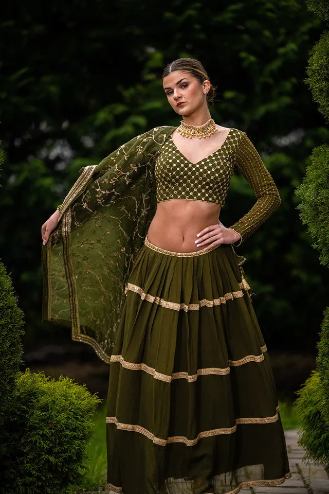 Beautiful Mehendi Green Colored Heavy Lehenga Set - Rent