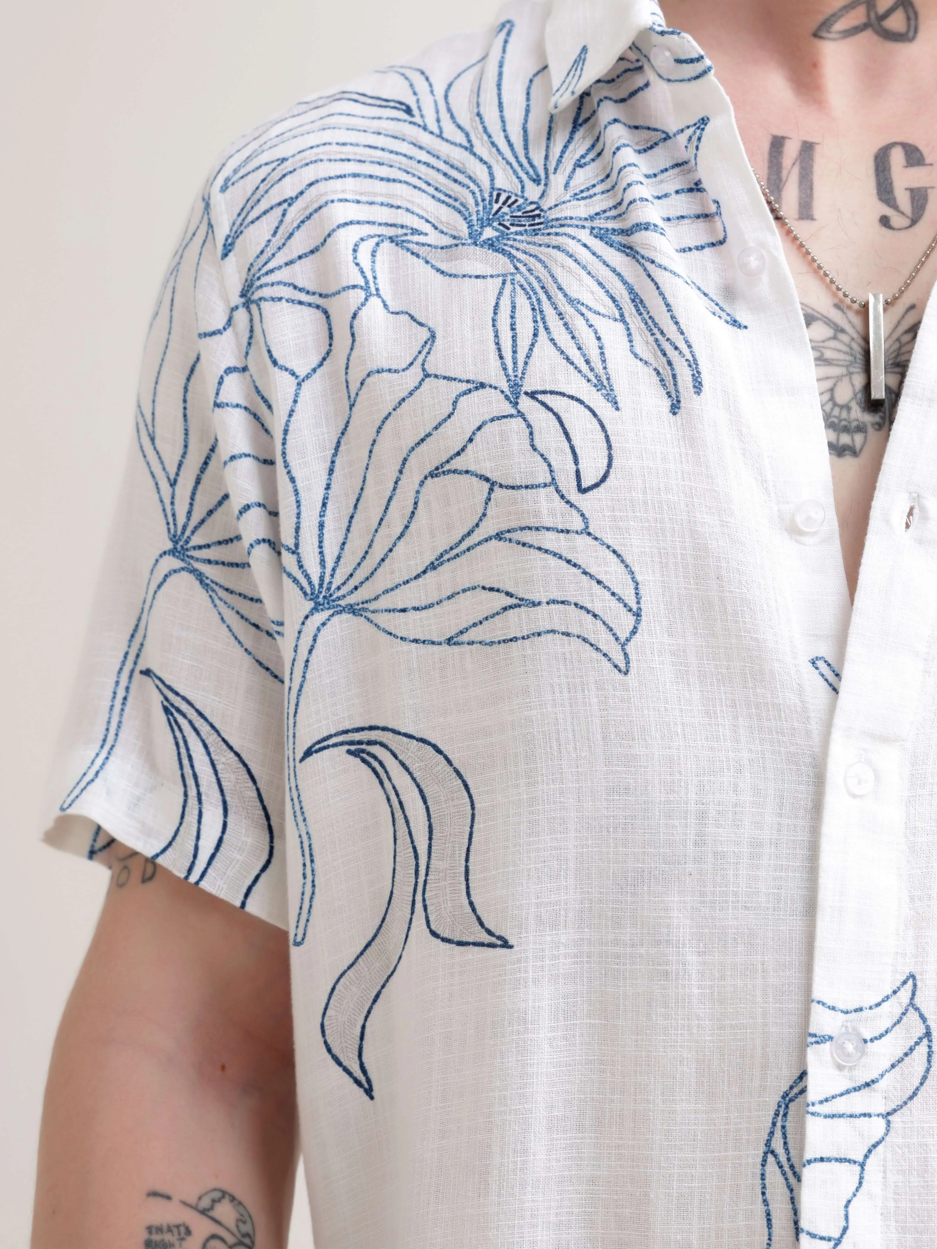 Floral printed blue half sleeve shirt