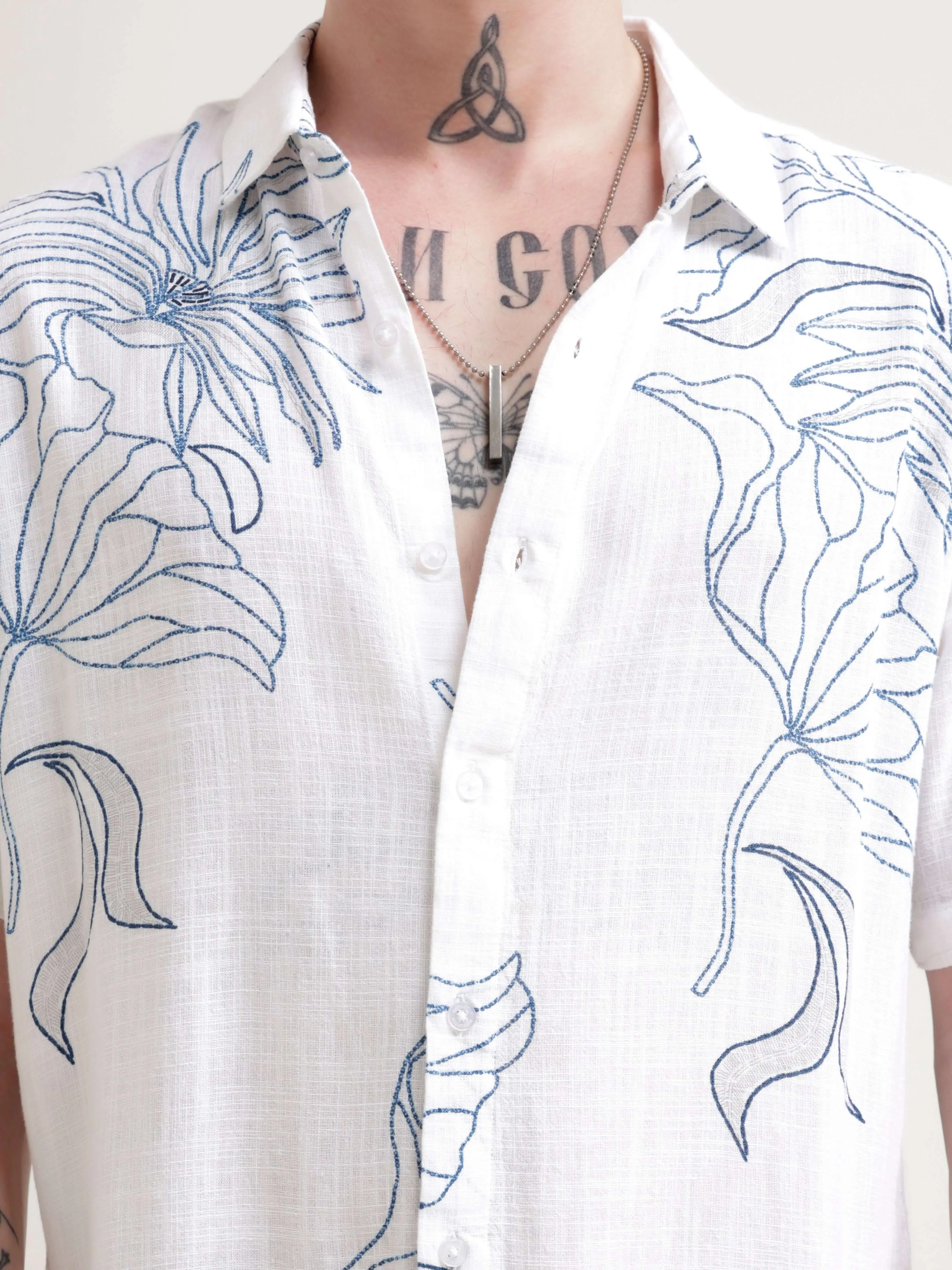 Floral printed blue half sleeve shirt