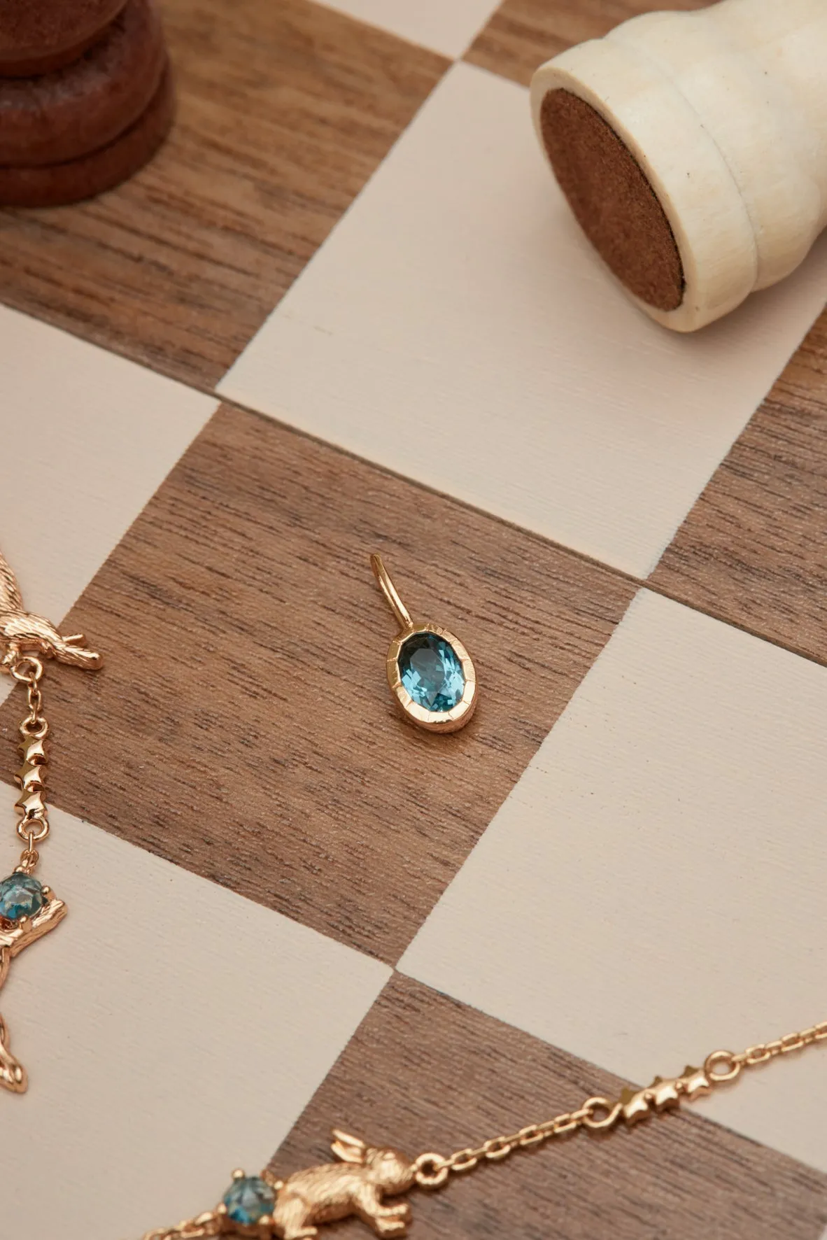 Oval Blue Topaz Gold Pendant