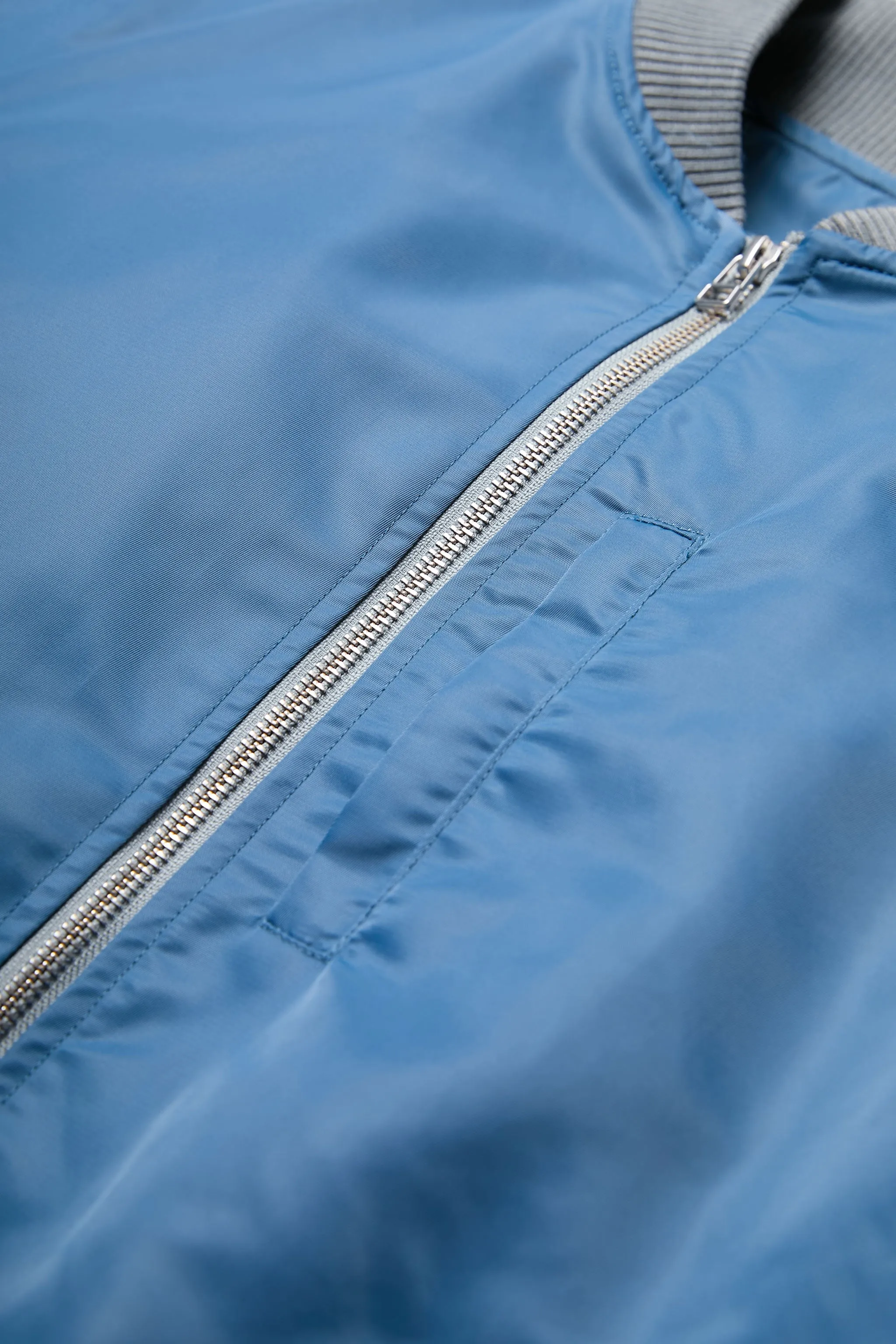 Blue Strata Bomber Jacket with Enhanced Features